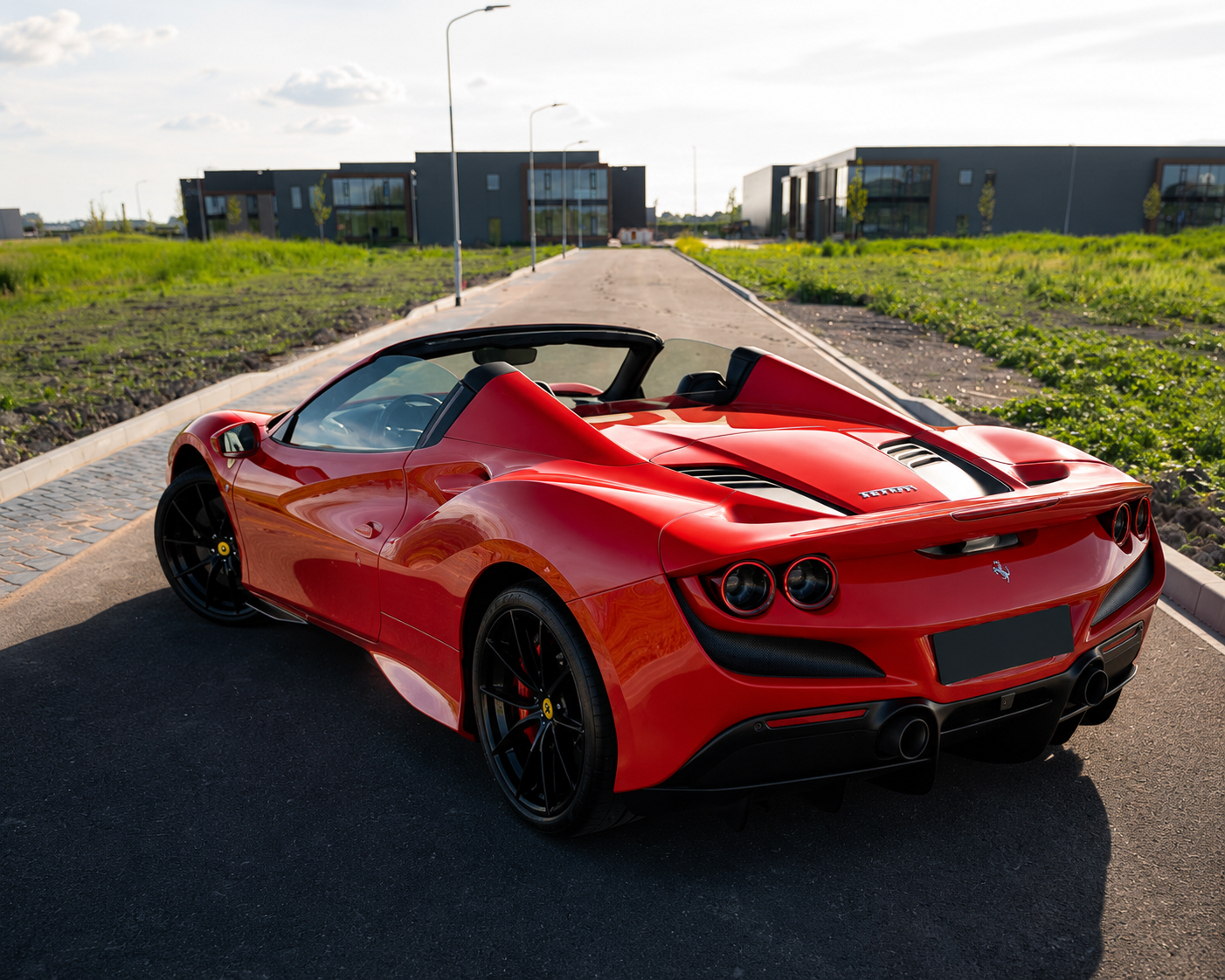 Ferrari F8 Spider, rear three-quarter view, roof down